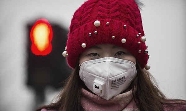 Bắc Kinh ban bố tình trạng ô nhiễm không khí ở mức “báo động đỏ” trong 3 ngày trong tuần này. Ảnh: Kevin Frayer / Getty Images