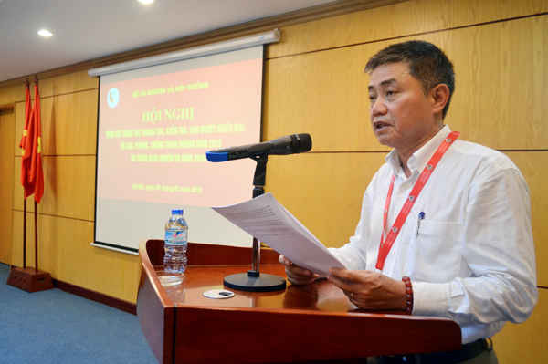 Ông Lê Quốc Trung - Chánh thanh tra Bộ TN&MT báo cáo tại Hội nghị