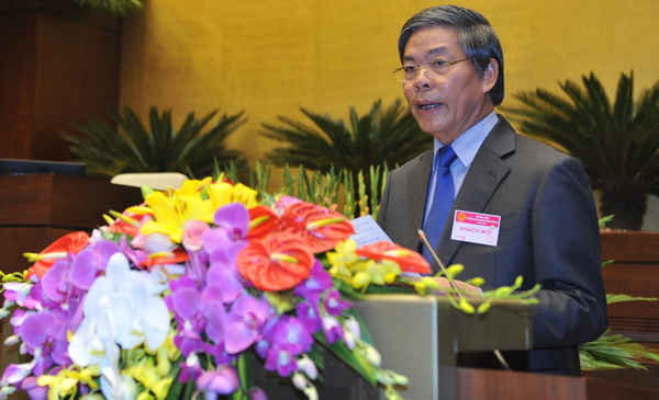 Nguyên Bộ trưởng Bộ TN&MT Nguyễn Minh Quang báo cáo trước Quốc hội. 