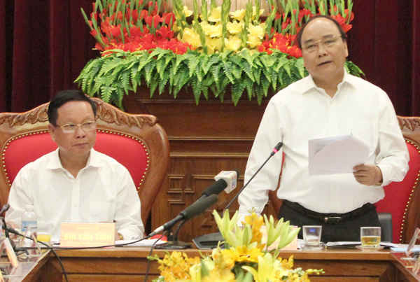 Thủ tướng Chính phủ Nguyễn Xuân Phúc phát biểu tại buổi làm việc sáng 19/11. Ảnh: Lan Trung