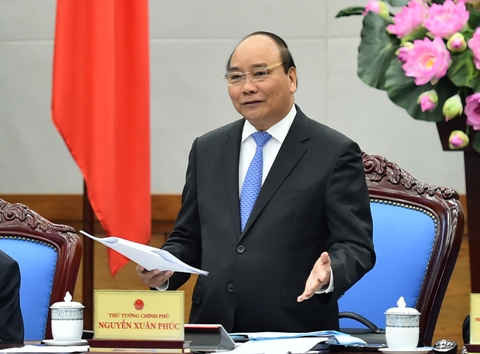Thủ tướng Nguyễn Xuân Phúc nêu rõ 10 kết quả nổi bật năm 2016, trong đó tăng trưởng GDP đạt 6,21%. Ảnh: VGP