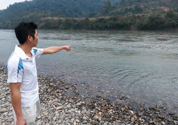 Khu vực VĐV Lương Thị M. trợt chân ngã xuống dòng sông Hồng bị thiệt mạng chiều ngày 19/2. Ảnh: Báo Lào Cai điện tử 