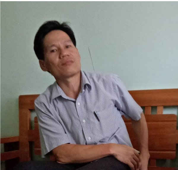 Ông Hà Văn Tuấn, Trưởng ban QLXDCB Như Xuân trao đổi với PV
