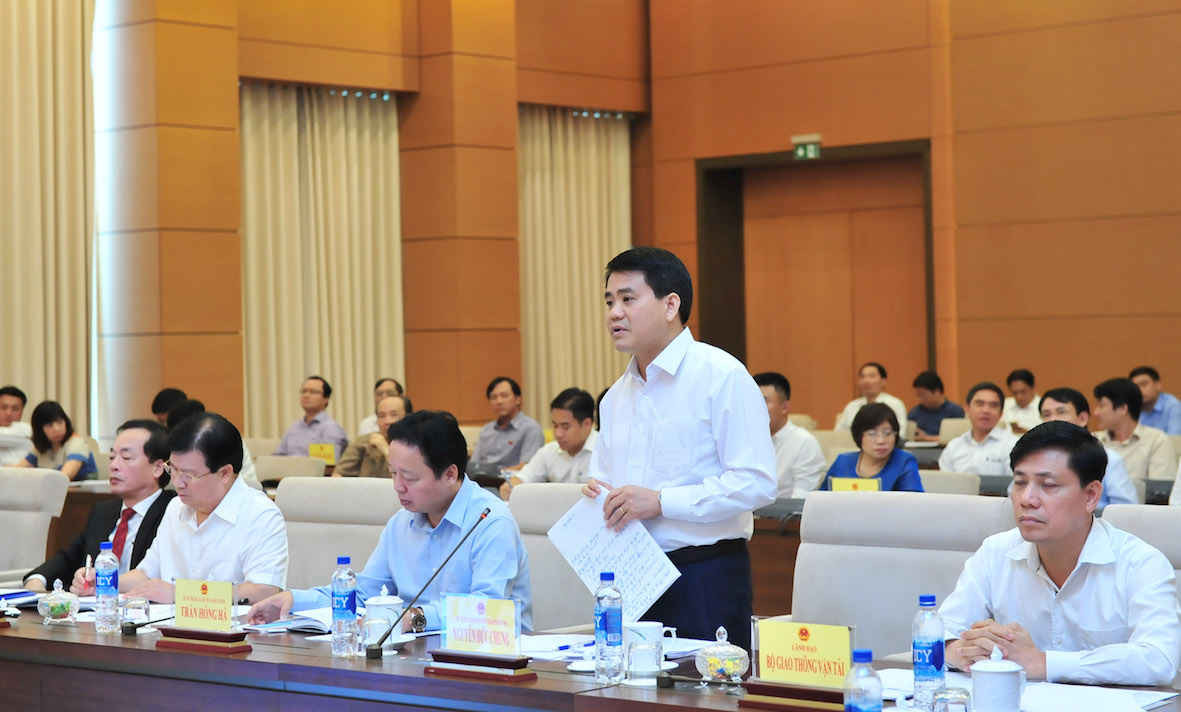 Chủ tịch UBND TP Hà Nội Nguyễn Đức Chung trả lời chất vấn - Ảnh: Quốc Khánh 