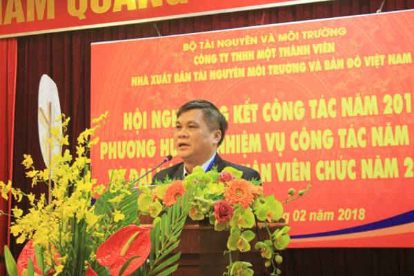 Ông Kim Quang Minh - Chủ tịch kiêm Tổng Giám đốc Nhà Xuất bản Tài nguyên - Môi trường và Bản đồ Việt Nam trình bày báo cáo