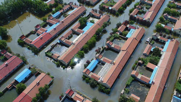 Toàn cảnh trên không cho thấy một ngôi làng bị ngập lụt sau cơn bão Rumbia ở Thọ Quang, tỉnh Sơn Đông, Trung Quốc vào ngày 24/8/2018. Ảnh: Reuters/Stringer