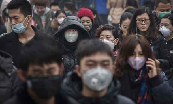 Ô nhiễm không khí ở Trung Quốc cao gấp 3 lần giới hạn của Tổ chức Y tế Thế giới. Ảnh: Kevin Frayer / Getty Images