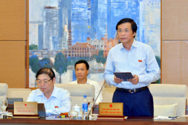 ​ Tổng Thư ký Quốc hội, Chủ nhiệm Văn phòng Quốc hội Nguyễn Hạnh Phúc báo cáo (Ảnh chụp qua màn hình) ​