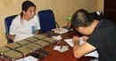 Bắt quả tang 1 sơn nữ vận chuyển 10 bánh heroin