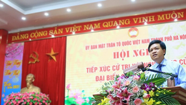 Ông Tạ Đình Thi, Tổng cục trưởng Tổng cục Biển và Hải đảo Việt Nam báo cáo chương trình hành động trước cử tri huyện Mỹ Đức