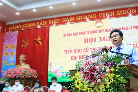 Ông Tạ Đình Thi, Tổng cục trưởng Tổng cục Biển và Hải đảo Việt Nam báo cáo chương trình hành động trước cử tri huyện Mỹ Đức