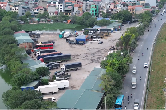 Quận Hoàng Mai (Hà Nội): San lấp vật liệu xây dựng làm bãi xe trái phép trên địa bàn phường Yên Sở