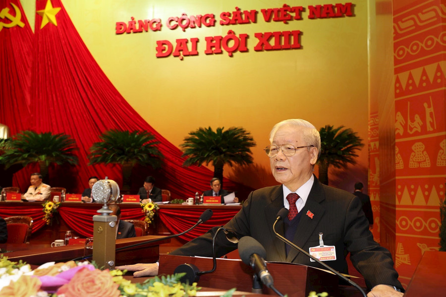 Tổng Bí thư, Chủ tịch nước Nguyễn Phú Trọng trình bày Báo cáo của Ban Chấp hành Trung ương Đảng khóa XII về các Văn kiện trình Đại hội XIII